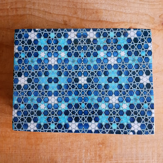 Add a touch of cultural elegance to your home with this Ceramic Glazed Wood Box. Expertly crafted, it combines the durability of solid wood with the glossy sophistication of glazed ceramic, making it both functional and decorative.