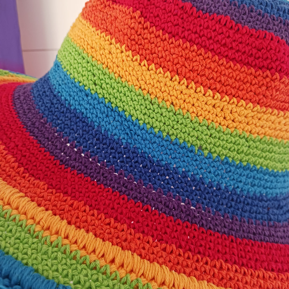 Add a splash of colour to your summer wardrobe with this beautiful Handmade Rainbow Crochet Cotton Sun Hat. Carefully handcrafted, this vibrant hat is designed to keep you comfortable while making a bold statement wherever your adventures take you.