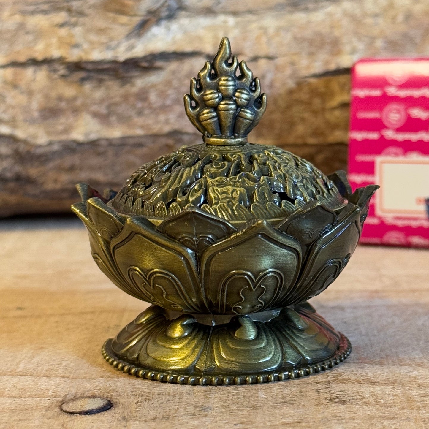 Enhance your home’s ambiance with this beautiful brass cone holder, thoughtfully designed in the shape of a lotus flower. Whether used for burning incense cones or as a charming decorative piece, this holder is both functional and elegant.
Key Features:
Elegant Lotus Design: The intricate lotus flower shape symbolizes purity and serenity, making it a meaningful addition to any space.
Majestic Smoke Display: Watch as the smoke gracefully curls through the lid’s opening, creating a soothing and captivating e