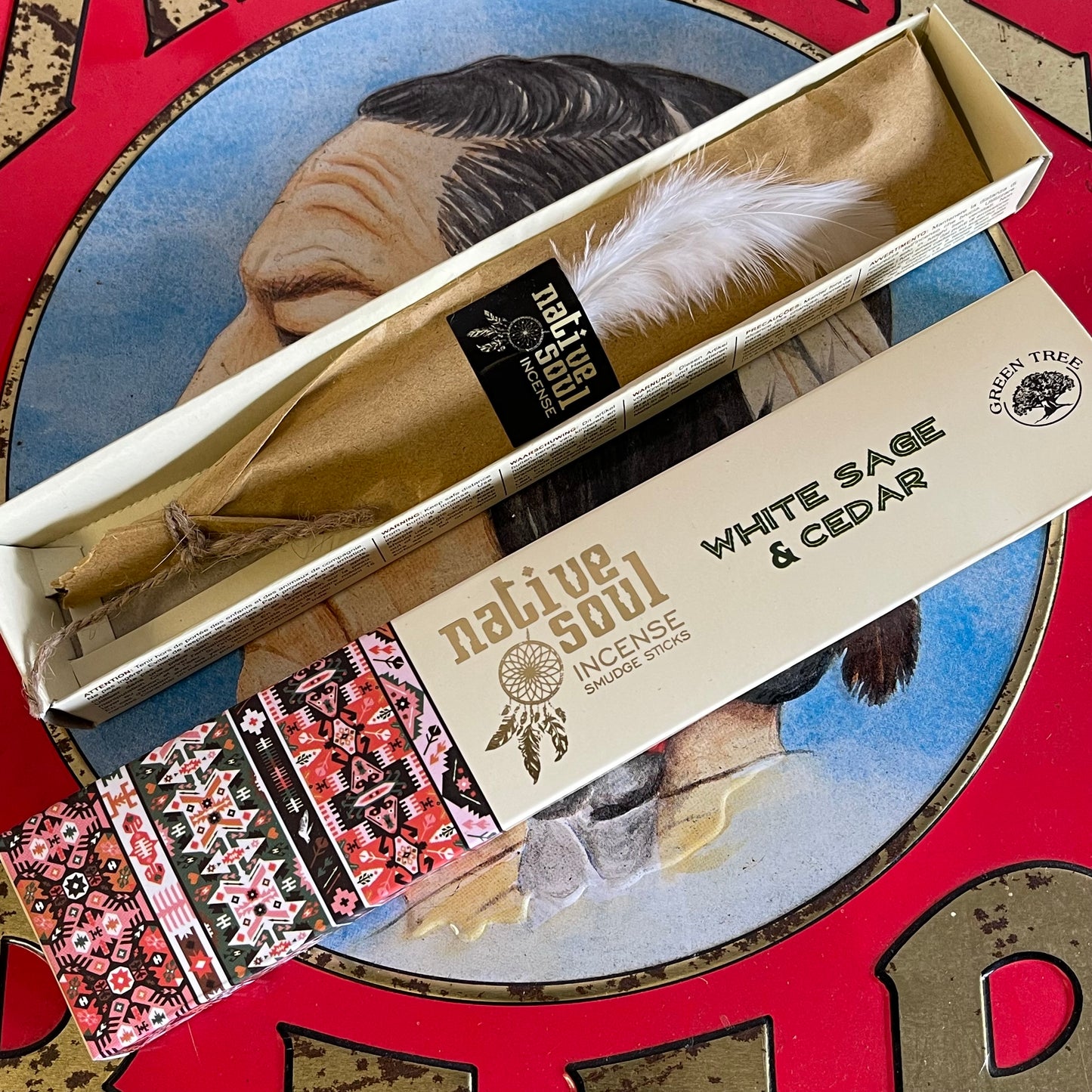 This White Sage and Cedar Native Soul Incense has been blended perfectly together to create a calming atmosphere whilst restoring balance to the mind and soul. The incense is beautifully packaged within a sliding box decorated with native American print on the outside and finished with a delicate feather on the inside Unlock the power of natural aromatherapy with our White Sage and Cedar Native Soul Incense. This carefully crafted blend creates a calming atmosphere that promotes balance of the mind and soul
