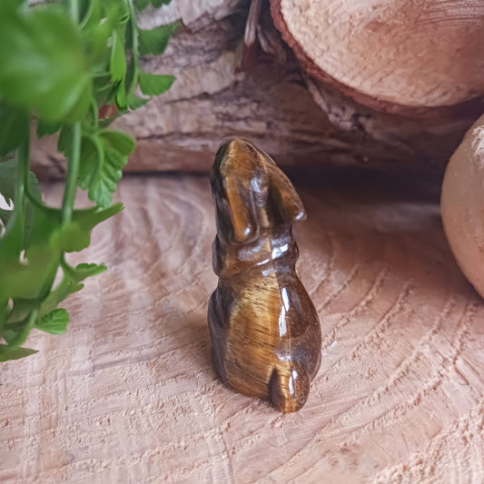 This cute little golden Tigers Eye rabbit has been hard carved from the stone with unique markings reminiscent of rich gold brown fur. As these are hand carved, each bunny is unique and individual.