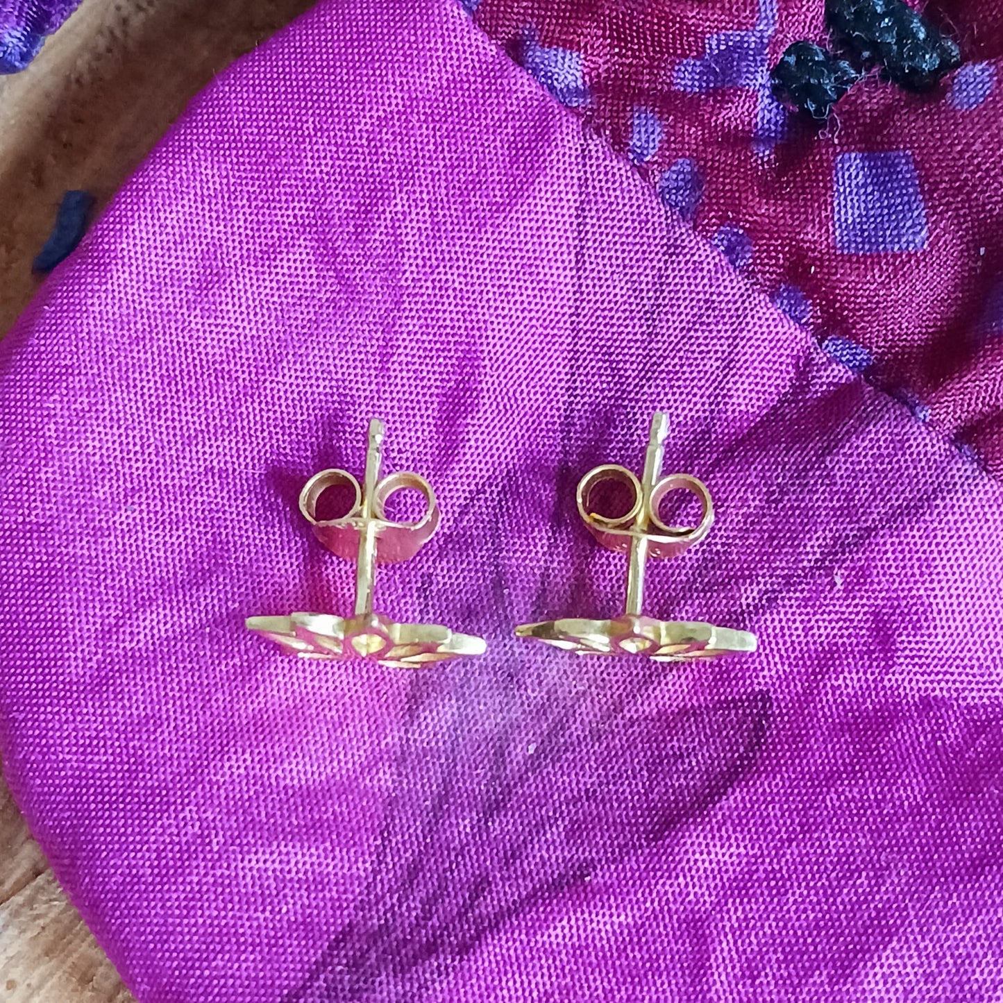These pretty little gold plated 925 silver studs feature a Lotus Flower design. Perfect to wear everyday with anything, or as a gift for family and friends.