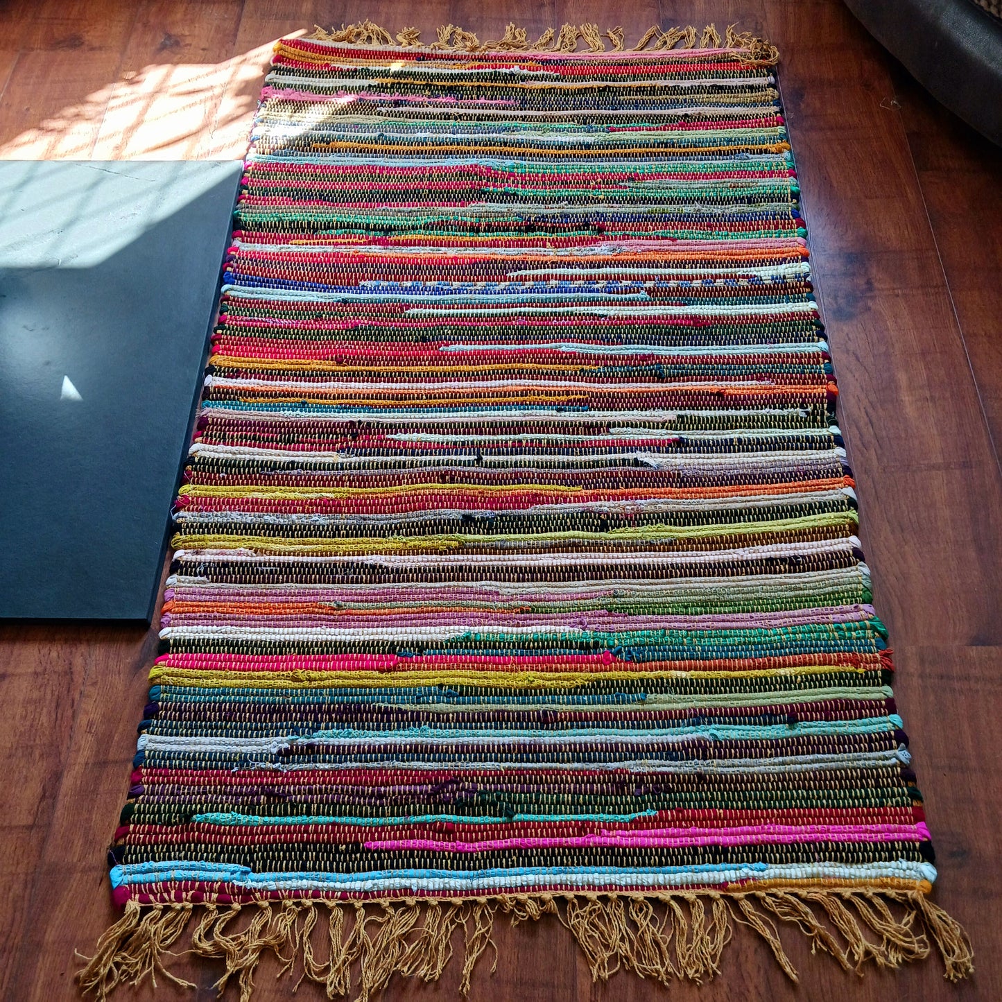 These Indian rugs are hand made from cotton and recycled materials from the Indian textile industry, so they're very eco friendly and great value. They can be used in any room and will bring instant comfort and style to your home.