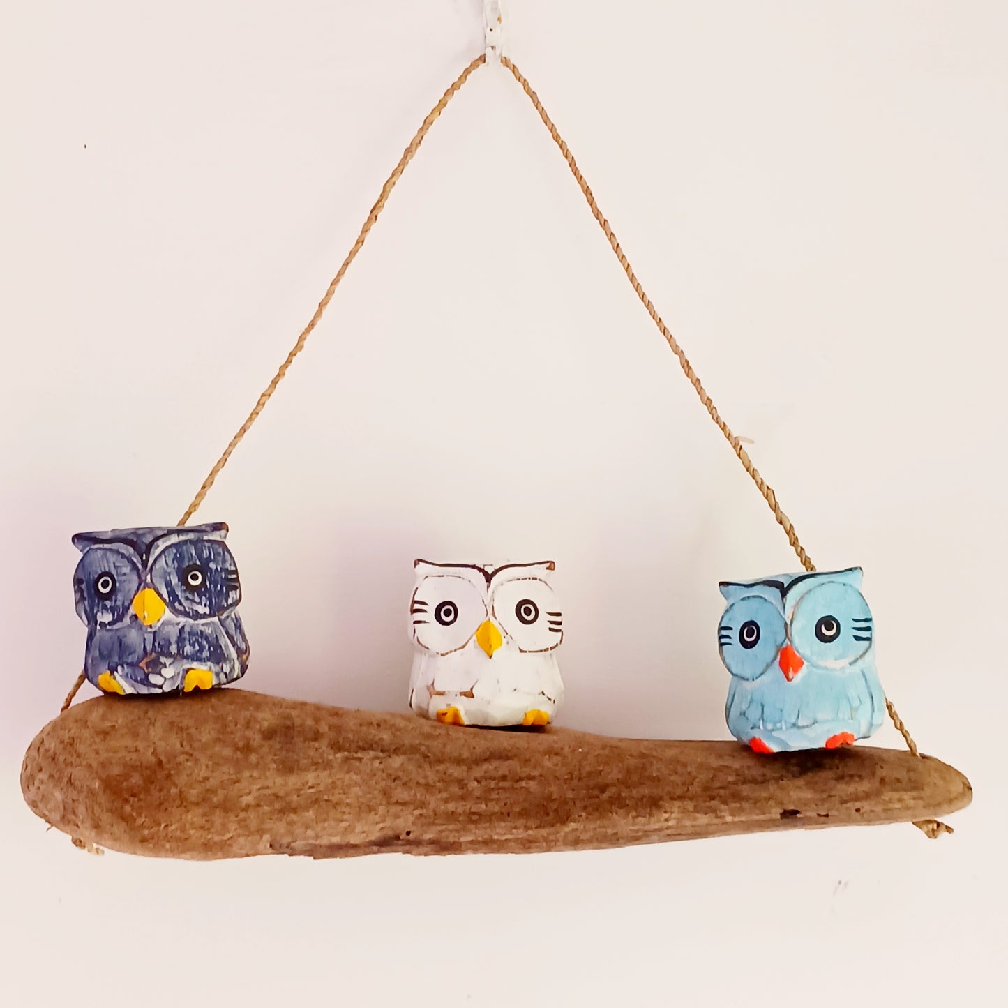 Bring a touch of woodland charm to your home with this Handmade Owl Set, beautifully hand-carved and perched on natural driftwood. These wise little birds add rustic warmth and organic character to any living space.