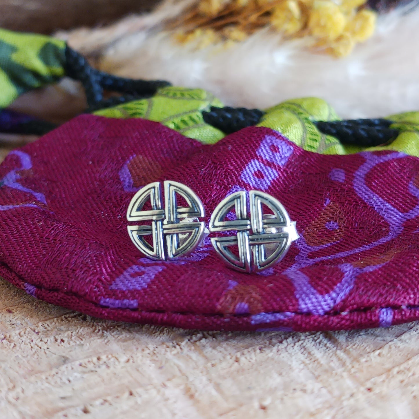 Beautifully crafted 925 sterling silver Celtic stud earrings, featuring ancient Celtic artwork translated into intricate jewellery. A timeless piece, rich in history and symbolic meaning.