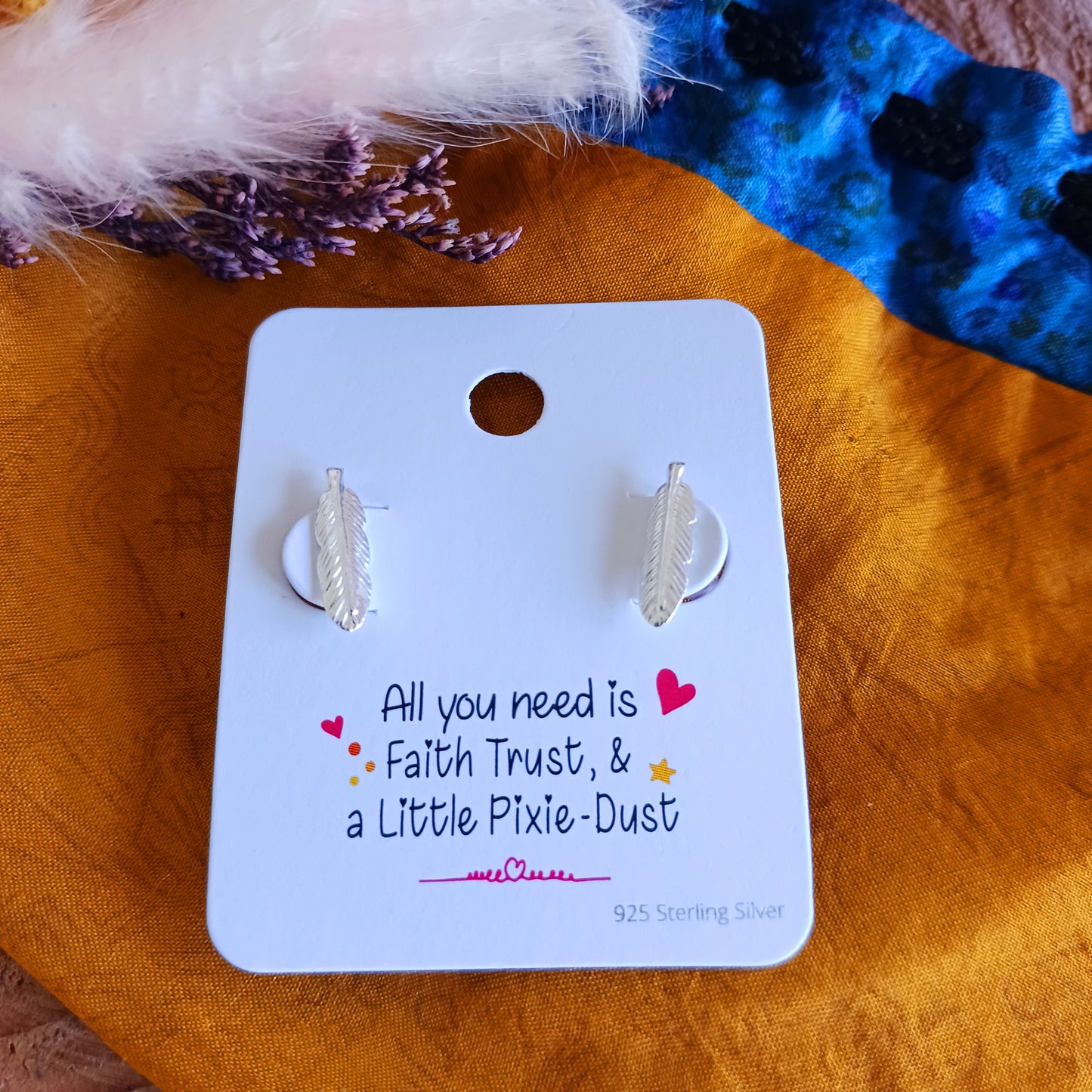 These perfectly shaped sterling silver feather stud earrings have been crafted in 925 silver with detailed barbs and rounded tip. These earrings make a subtle on-trend statement. Ideally sized to be worn alone or with 2nd or 3rd ear piercings.