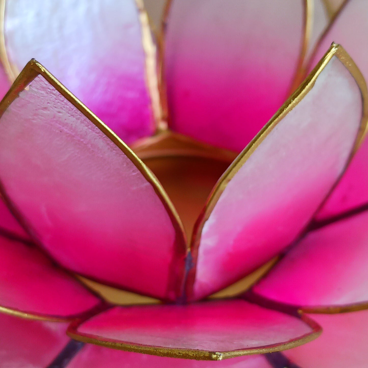 The Lotus Flower is a symbol of achieving enlightenment, peacefulness and spirituality. This beautiful candle holder can be fitted with tealight candles or slightly larger candles. The diameter of the middle is roughly 5.5cm, so it will fit any candle with the same diameter.