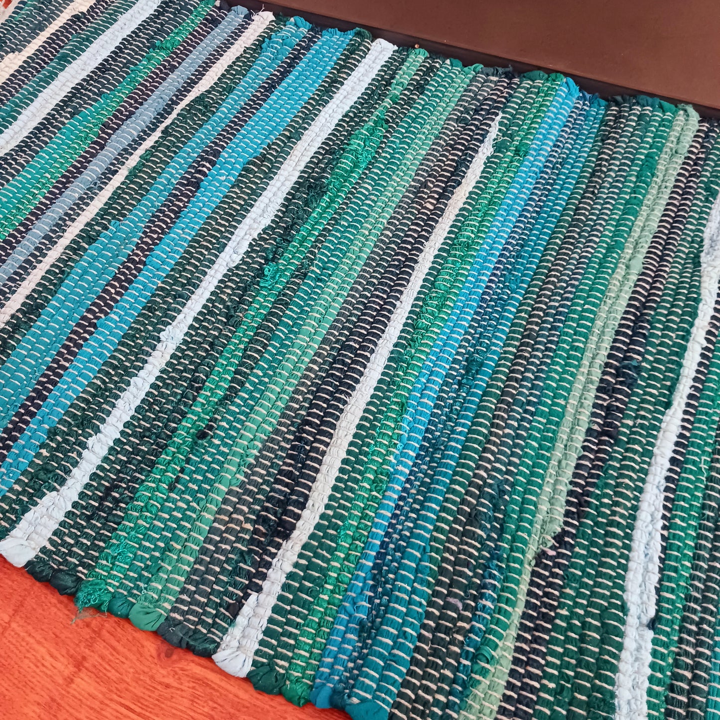 Enhance your living space with this premuim quality rag rug. Whether used in kitchens, bathrooms, or even as a decorative accent in bedrooms and living rooms, the aqua blues will bring a sense of serenity and freshness to any environment.