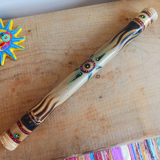 Bring the soothing sound of rainfall into your home with this beautifully handcrafted bamboo rainstick. Made using a hollow length of natural bamboo, this traditional percussion instrument creates a calming rain-like sound effect that is perfect for meditation, sound healing, relaxation, music sessions, classrooms, or unique home décor.