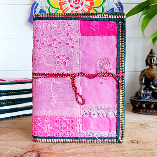 This beautifully bound notebook with handmade paper is from recycled cotton. An imaginative use for sari offcut material, the cover is edged and framed with pretty brocade material to complete a lovely and unique eco friendly stationery gift.