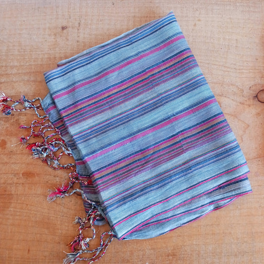 Immerse yourself in the alluring world of bohemian fashion with this delicate Indian Boho Scarf. Crafted with care, each scarf captures the essence of India's free-spirited charm, adding a touch of Boho elegance to your outfit.