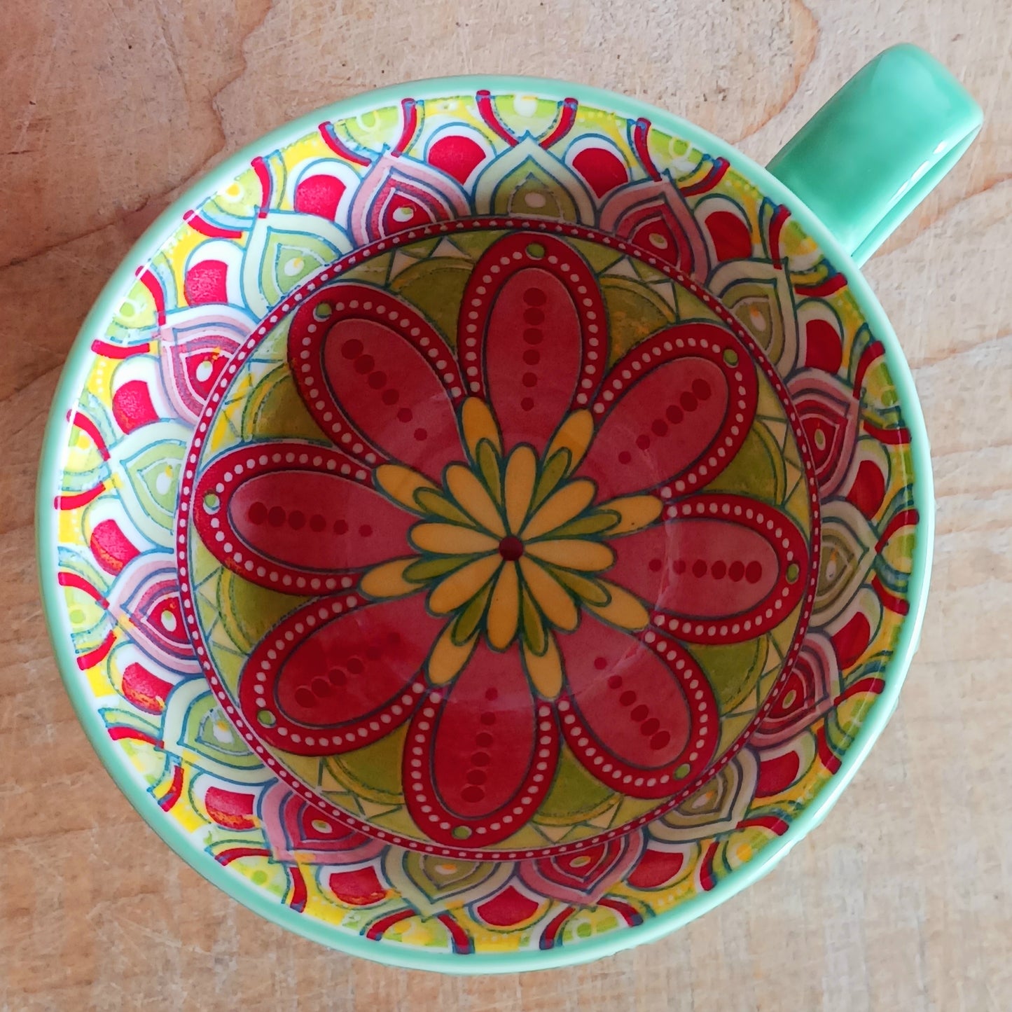 Bring Mediterranean charm to your kitchen with these beautiful Tuscany-inspired ceramic mugs. Featuring a vibrant glaze outside and embossed geometric patterns inside, they capture the rustic warmth of terracotta tiles and intricate murals found in sun-soaked Italian villages. The kaleidoscopic interiors add a burst of artistic flair, making them perfect for your morning coffee or evening tea. Stylish and versatile, these mugs are a thoughtful gift or a delightful treat for yourself.