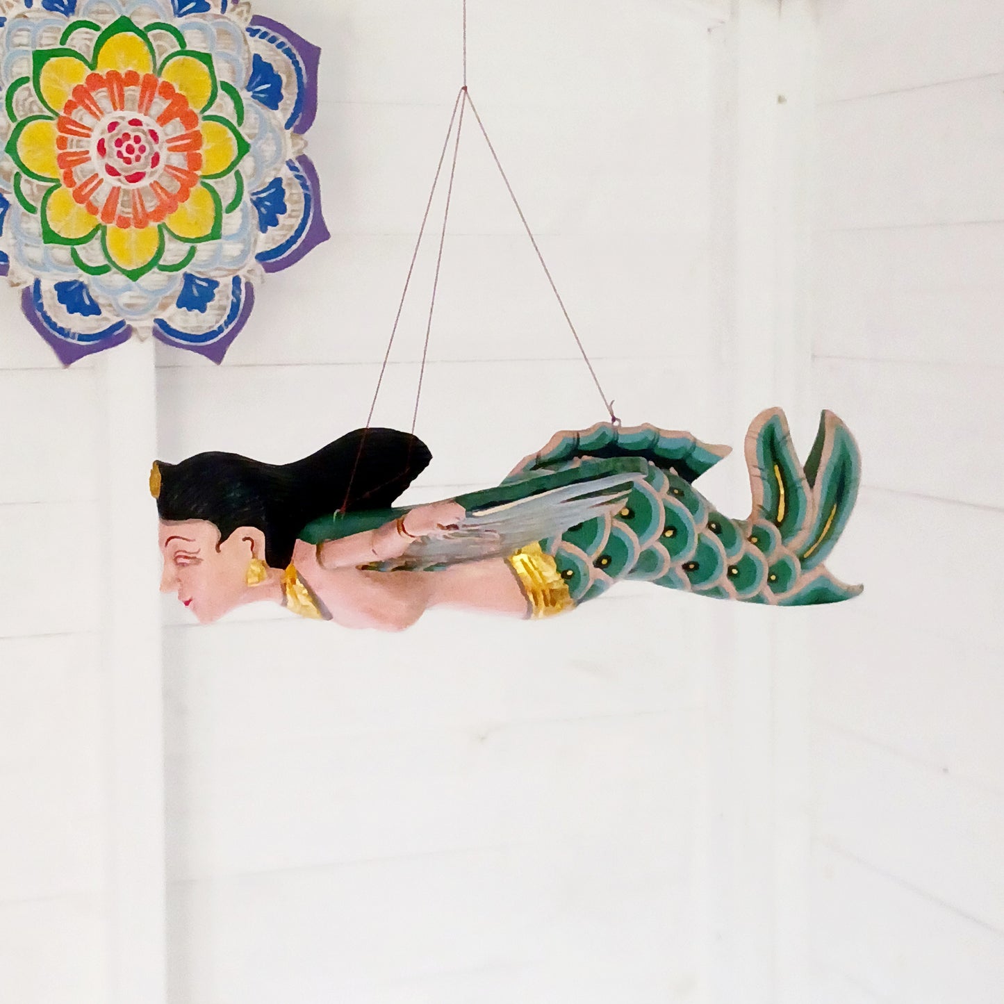 This beautiful and unique handcrafted Flying Mermaid Ceiling Hanger has been designed to inspire wonder, this enchanting ceiling mobile features a graceful mermaid that appears to swim through the air. Perfect for nurseries, bedrooms, playrooms, or creative spaces, it adds a dreamy and imaginative touch to any room.