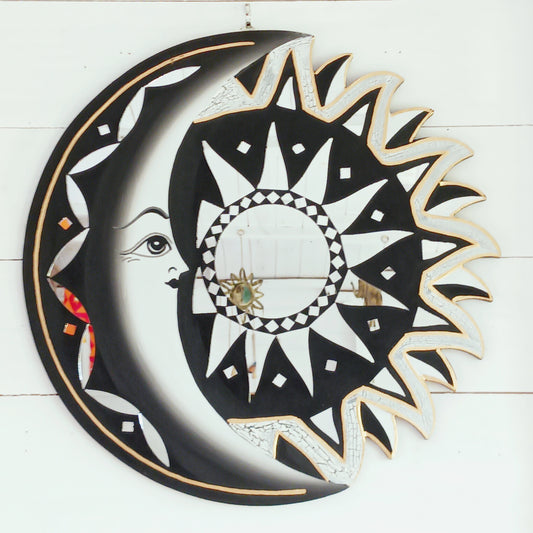 Bring the power of the sun and moon into your home with this stunning mirror. This unique eco-friendly piece allows you to express your spiritual side and add a vibrant touch to any space with silver hues echoing the brightness of solar and lunar energy. It's quirky, eclectic and great for a fresh bit of decor.