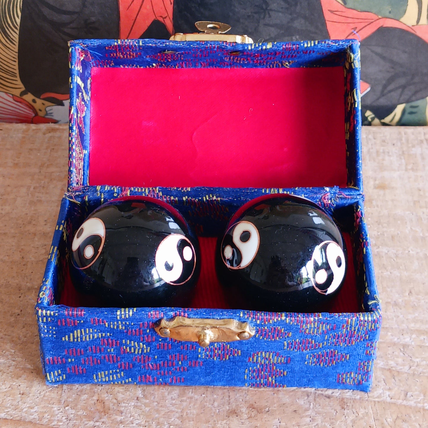 Boost hand flexibility and focus with Chinese Health Balls. Includes 2 chime balls in a silk brocade box. Ideal for relaxation, therapy, and energy balance.