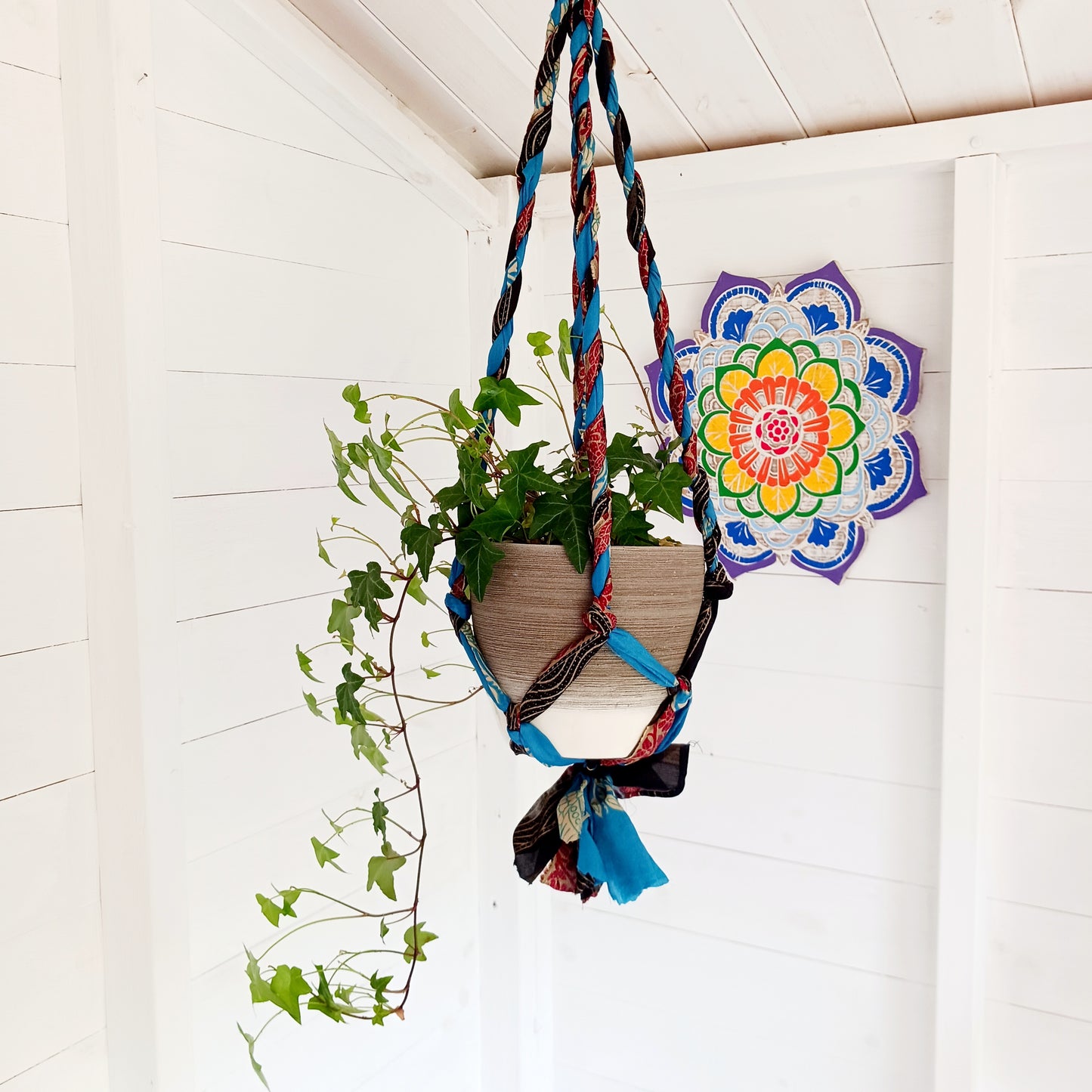 These beautiful sari plant hangers will add a splash of colour and boho chic to your home. Made from scraps of used sari, their simple design ensures that no fabric is wasted but is re-purposed into an elegant product.
