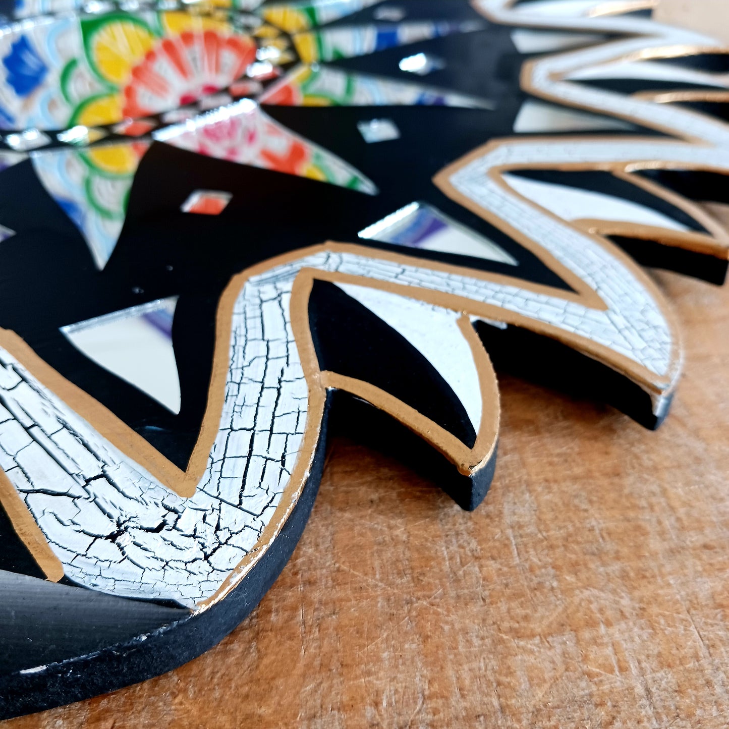 Bring the power of the sun and moon into your home with this stunning mirror. This unique eco-friendly piece allows you to express your spiritual side and add a vibrant touch to any space with silver hues echoing the brightness of solar and lunar energy. It's quirky, eclectic and great for a fresh bit of decor.