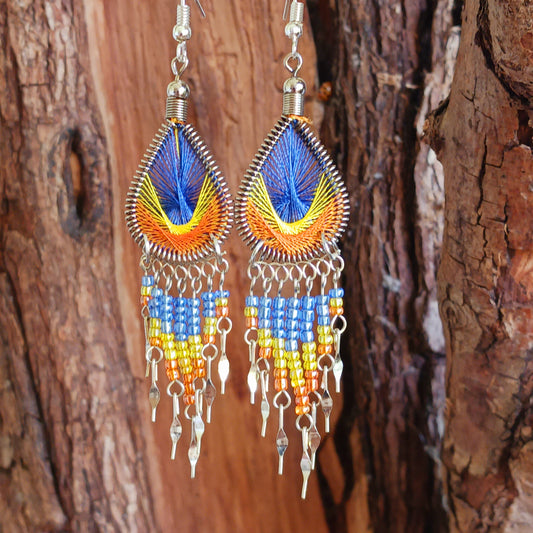 Our earrings are sourced from ethical and small family businesses, the eye-catching variation of traditional patterns and beads and contemporary detailing enhance the jewelry to make each item unique and individual, lovingly created in small workshops in Peru.