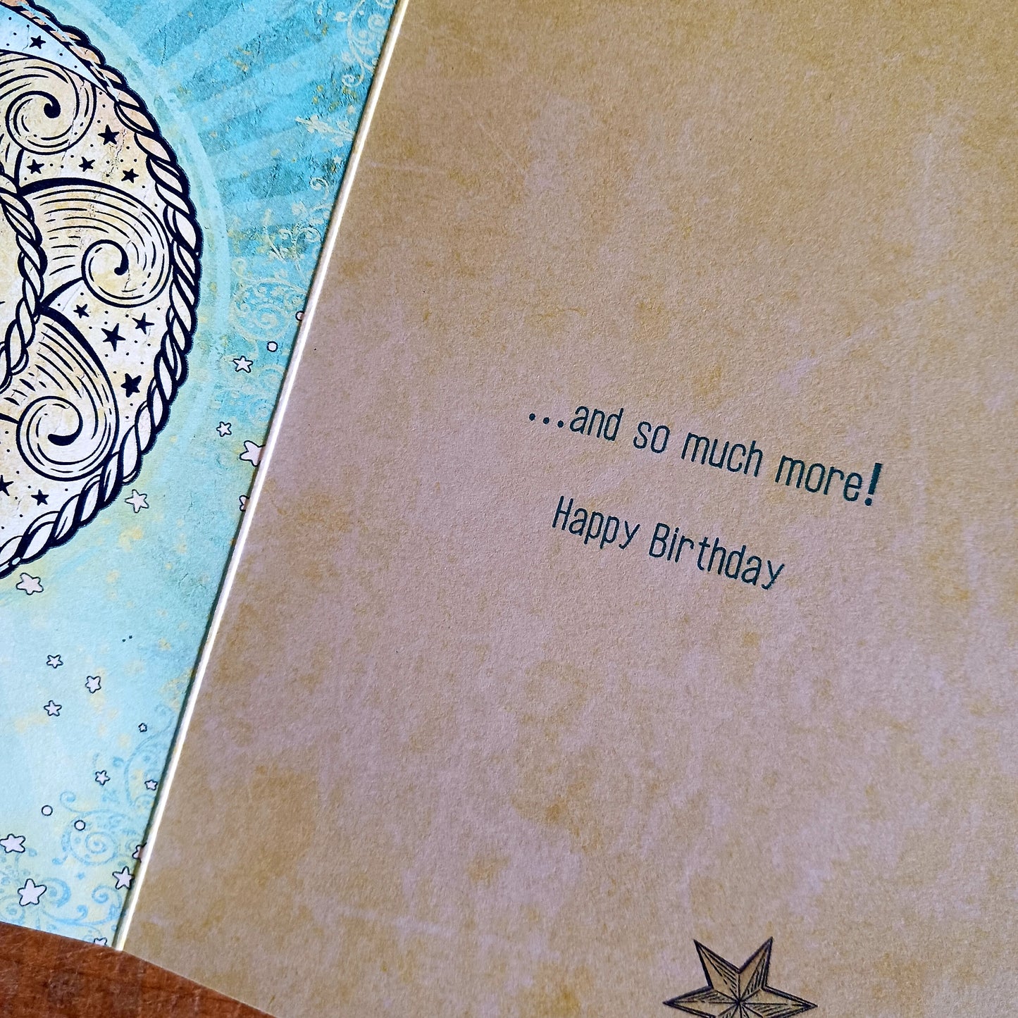 Sun, Moon and Stars greetings card for birthday. Inside the message reads: .....and so much more! Happy Birthday. The card comes with an illustrated envelope. Each card also has faint artwork inside.