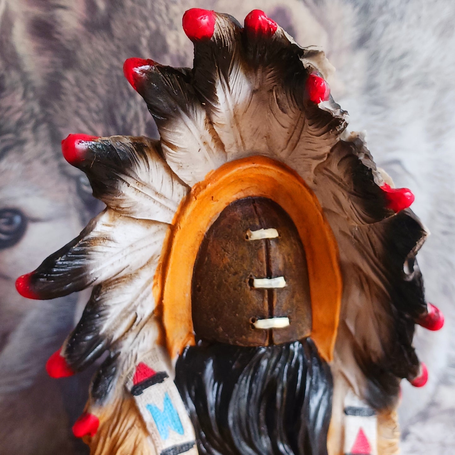 Elevate your space with the serene elegance of this Native American Chief Smoking a Peace Pipe figurine, a captivating symbol of wisdom and cultural harmony. Expertly crafted with intricate detail, this masterpiece depicts a noble chief in traditional tribal attire, smoking a symbolic peace pipe with grace and dignity. From the regal feathered headdress to the delicate carving of the pipe, every element reflects the artistry and cultural depth of Native American traditions.