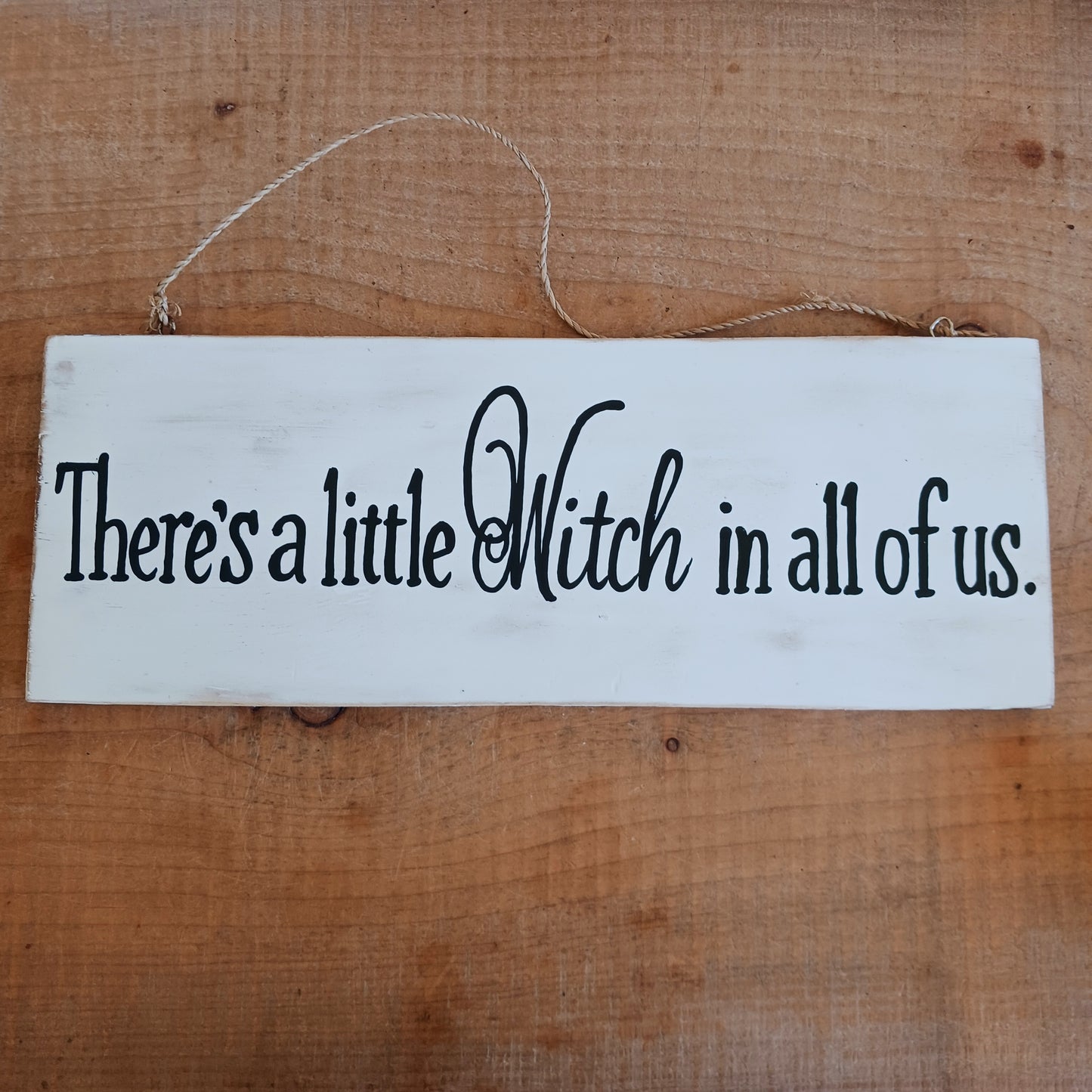 Celebrate your magical side with the There's a Little Witch in All of Us Wooden Wall Plaque. Featuring the enchanting quote, "There's a little Witch in all of us," this decorative wooden sign is a charming reminder to embrace your intuition, confidence, and unique spirit