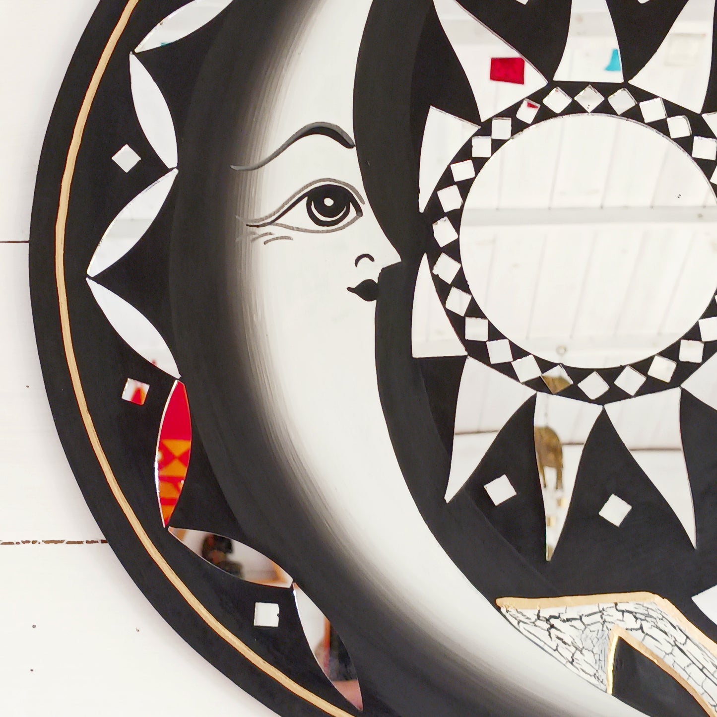 Bring the power of the sun and moon into your home with this stunning mirror. This unique eco-friendly piece allows you to express your spiritual side and add a vibrant touch to any space with silver hues echoing the brightness of solar and lunar energy. It's quirky, eclectic and great for a fresh bit of decor.