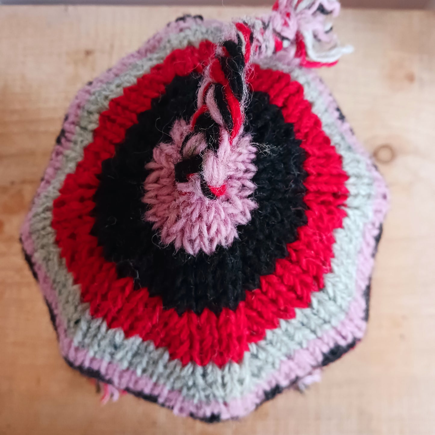 Stay cozy and stylish with our handmade chunky wool earflap hats, crafted in Nepal by skilled women artisans in Kathmandu. Each hat is 100% pure wool and features a soft polar fleece lining for extra warmth and comfort. Perfect for cold winter days, outdoor adventures, or adding a touch of handmade charm to your look.