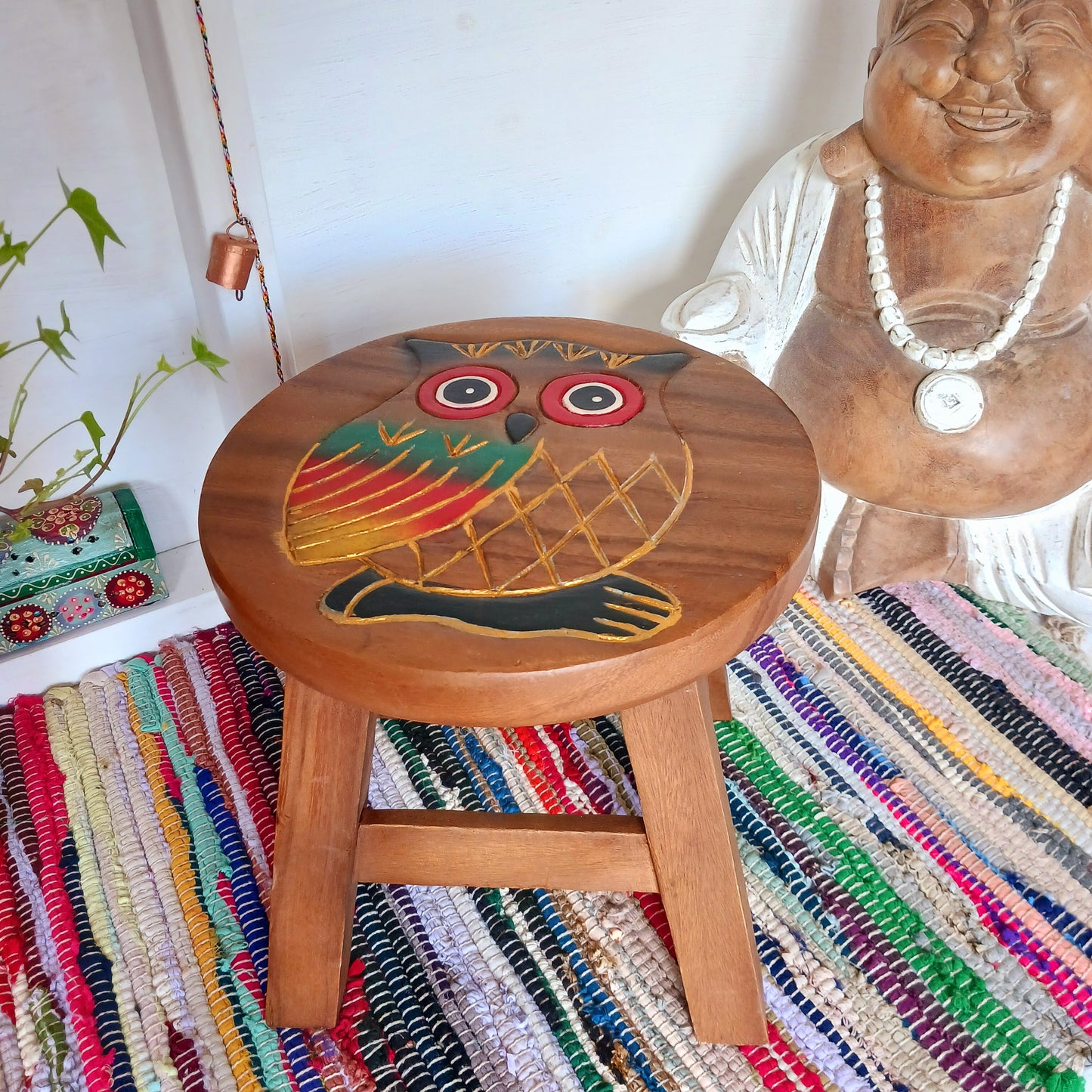 This lovely handmade, carved and painted stool is Fairtrade from Thailand. The top of this stool has been carefully hand carved and then painted to show a beautiful rustic owl. These cheeky little items are very versatile making great stools for little bums or as tiny tables to add accent to your home.