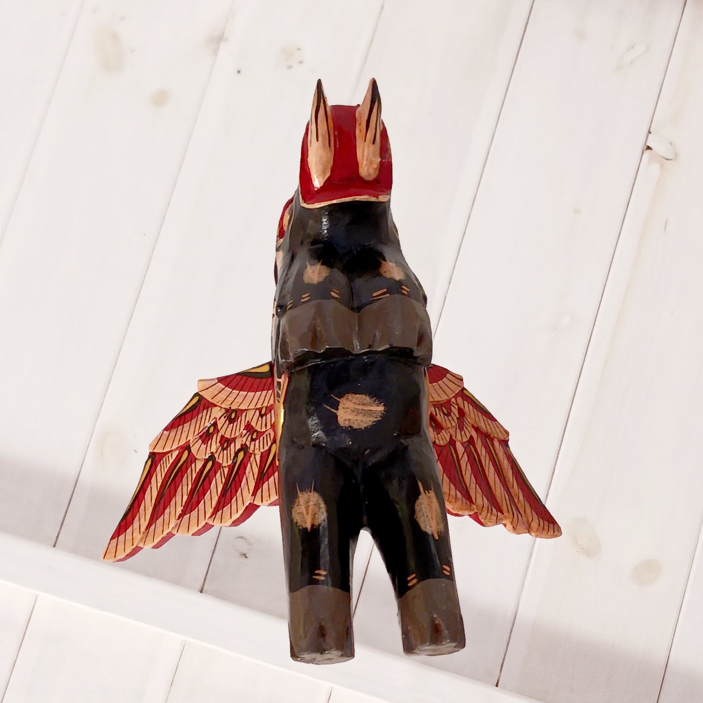 Bring a touch of wonder to your space with this enchanting Flying Elephant Mobile. Each piece is hand-carved from lightweight wood and finished with unique hand-painted patterns, giving every elephant its own personality. Delicately balanced wings hover gracefully with the slightest breeze, creating a calming sense of motion and magic.