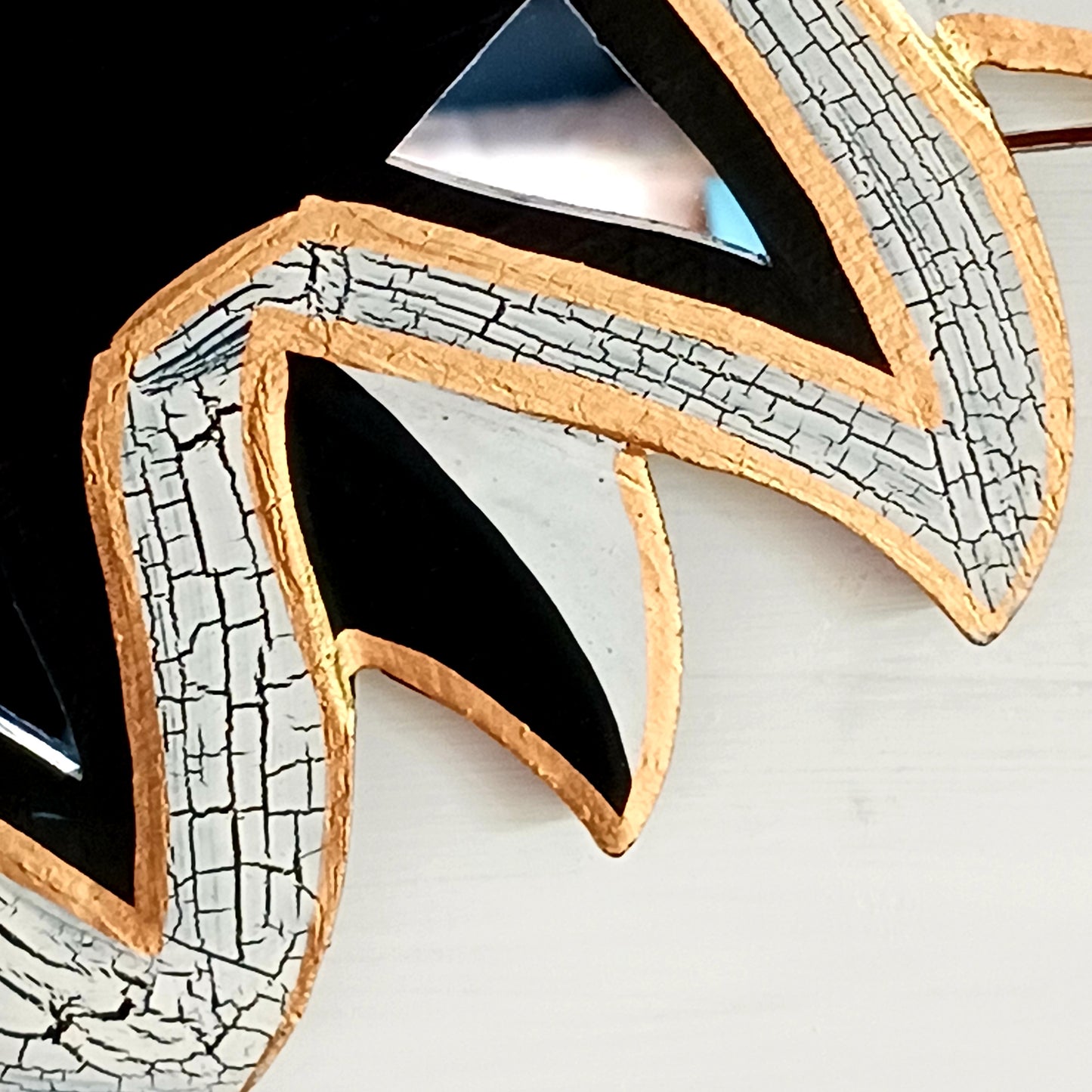 Bring the power of the sun and moon into your home with this stunning mirror. This unique eco-friendly piece allows you to express your spiritual side and add a vibrant touch to any space with silver hues echoing the brightness of solar and lunar energy. It's quirky, eclectic and great for a fresh bit of decor.