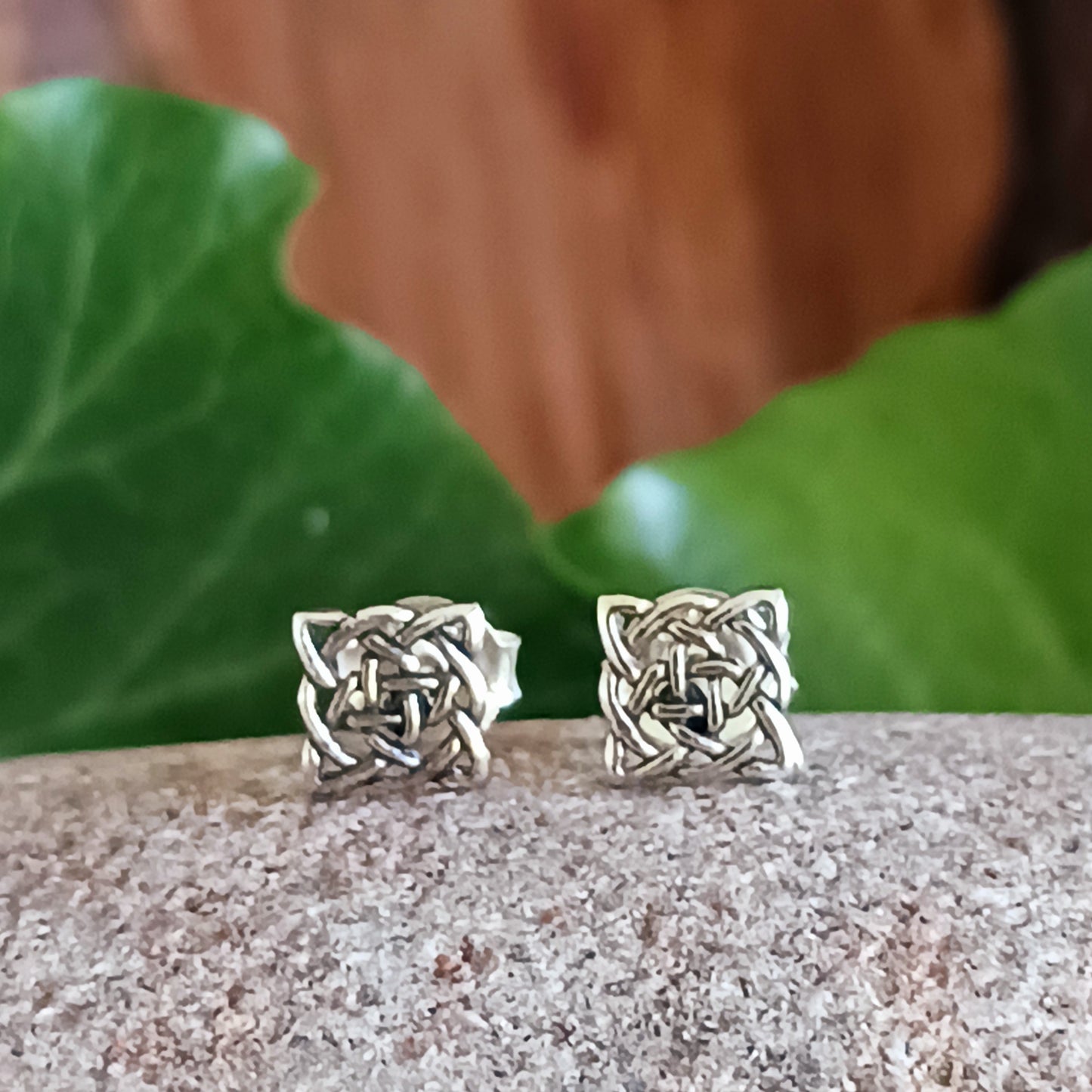 Beautifully crafted 925 sterling silver Celtic stud earrings, featuring ancient Celtic Knot artwork translated into intricate jewellery. A timeless piece, rich in history and symbolic meaning.