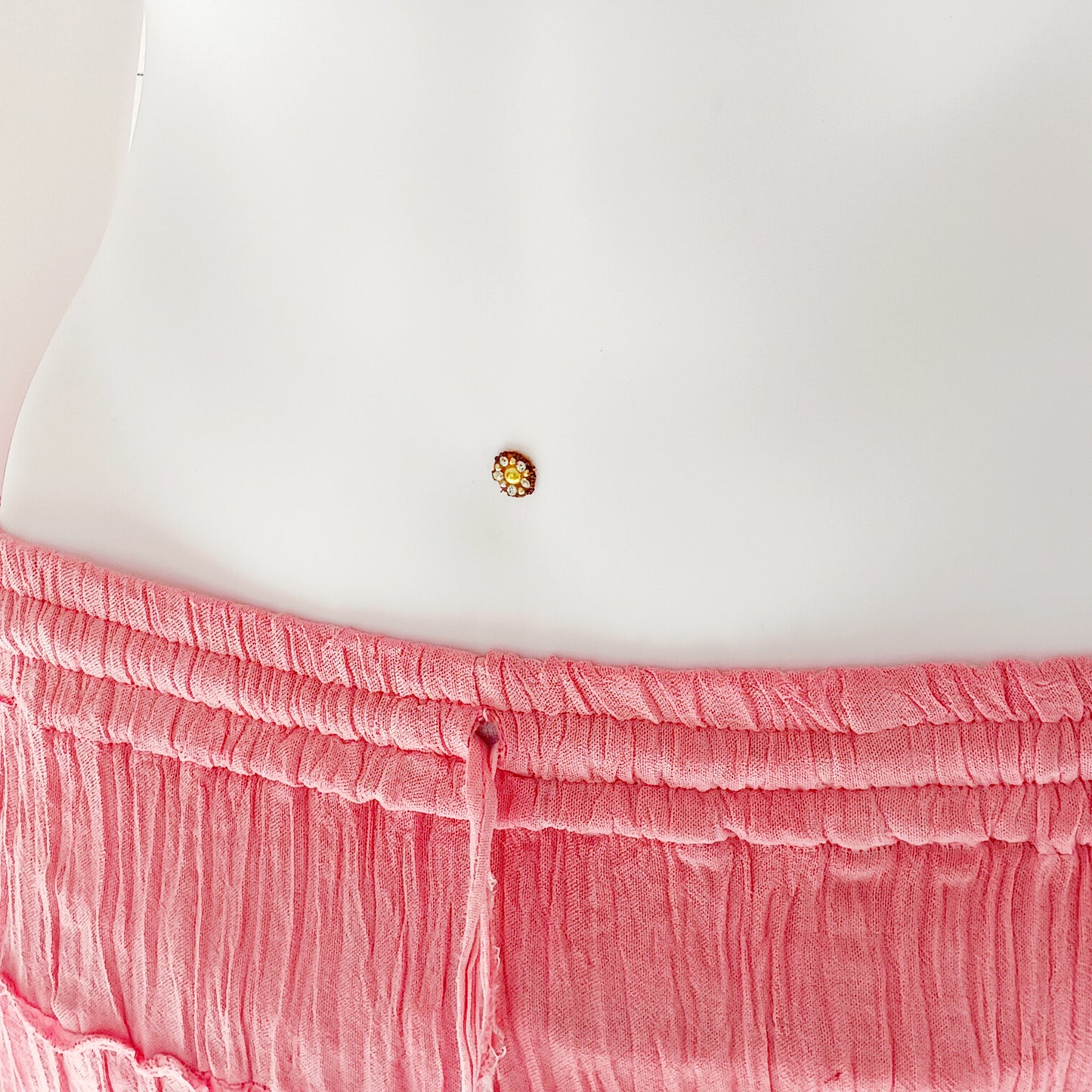 This beautiful Indian crinkle skirt is lovely and light so you can move with ease and comfort on a sunny day or a hot night. Made from rayon crepe, you can’t go wrong with this lovely skirt, it will add to your flowing summer style. And as rayon is quick drying, it also makes this a great beach cover up skirt.