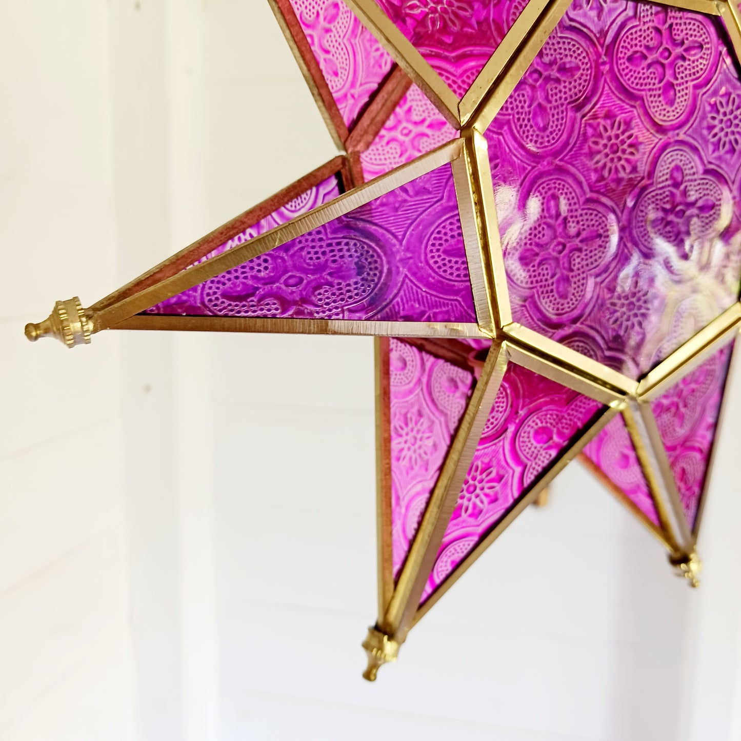 These Moroccan style star glass lanterns are handcrafted by skilled artisans and come in beautiful rich colours that catch the eye and instantly add atmosphere to any room.