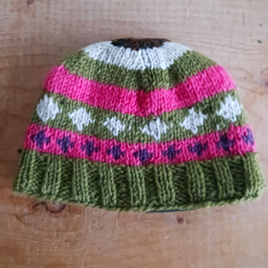Stay warm in authentic Himalayan style with our Handmade Chunky Wool Beanie Hats, lovingly hand-knitted in Nepal by skilled Kathmandu women artisans. Crafted from 100% natural wool and lined with soft polar fleece, these beanies provide exceptional warmth, comfort, and durability — perfect for cold weather adventures or everyday winter wear.