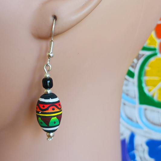 These cool Rasta earrings have silver plated hooks and are handmade in the UK using hand painted, round Peruvian Cusco beads.