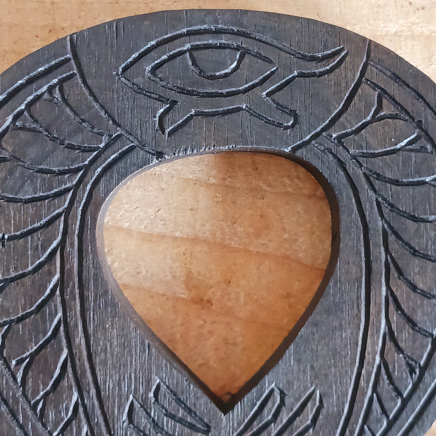 This beautiful and intricately carved wall plaque features a traditional symbol of the ancient Egyptians. The ankh is often interpreted as a symbol of life and eternal existence. Its looped top is thought to represent the eternal soul, while the straight line below symbolises the earthly plane or physical existence. Together, they signify the eternal cycle of life, death, and rebirth.
