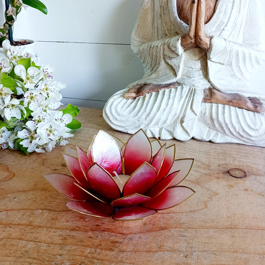 The Lotus Flower is a symbol of achieving enlightenment, peacefulness and spirituality. This beautiful candle holder can be fitted with tealight candles or slightly larger candles. The diameter of the middle is roughly 5.5cm, so it will fit any candle with the same diameter.