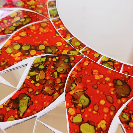 dd warmth, energy, and artistic charm to your home with this beautiful Vibrant Orange Mosaic Sun Mirror. Designed with dazzling orange mosaic tiles arranged in a radiant sunburst pattern, this captivating wall accent instantly brightens any room.