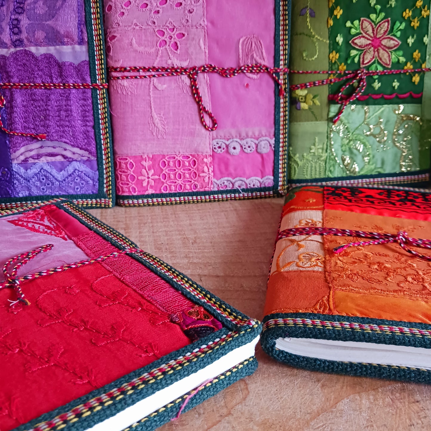 This beautifully bound notebook with handmade paper is from recycled cotton. An imaginative use for sari offcut material, the cover is edged and framed with pretty brocade material to complete a lovely and unique eco friendly stationery gift.