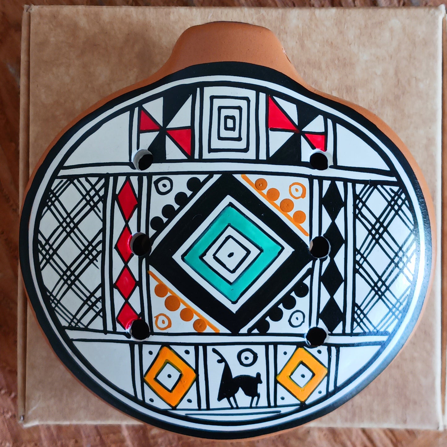 Experience the timeless sound of ancient cultures with these gorgeous ocarinas, handcrafted from fired clay in Peru. Adorned with vibrant, traditional designs, they are a favourite among musicians.
