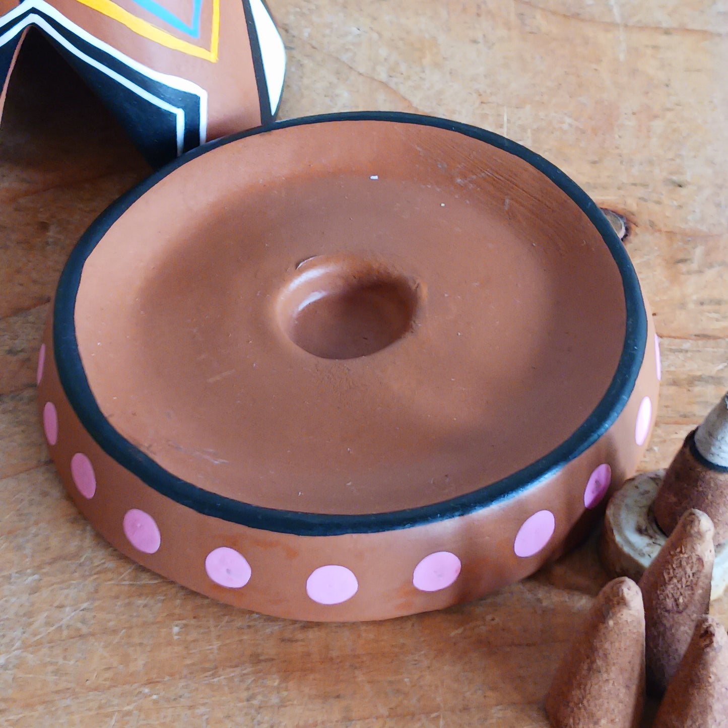 Elevate your incense game with our Clay Tipi Incense Holder. This unique piece has been lovingly handmade and is fairtrade, bringing a touch of charm and authenticity to your home. This quirky tipi design not only catches ash neatly but also adds a playful, earthy vibe to any space. Perfect for meditation, relaxation, or simply creating good vibes and maybe a few smoke signals!