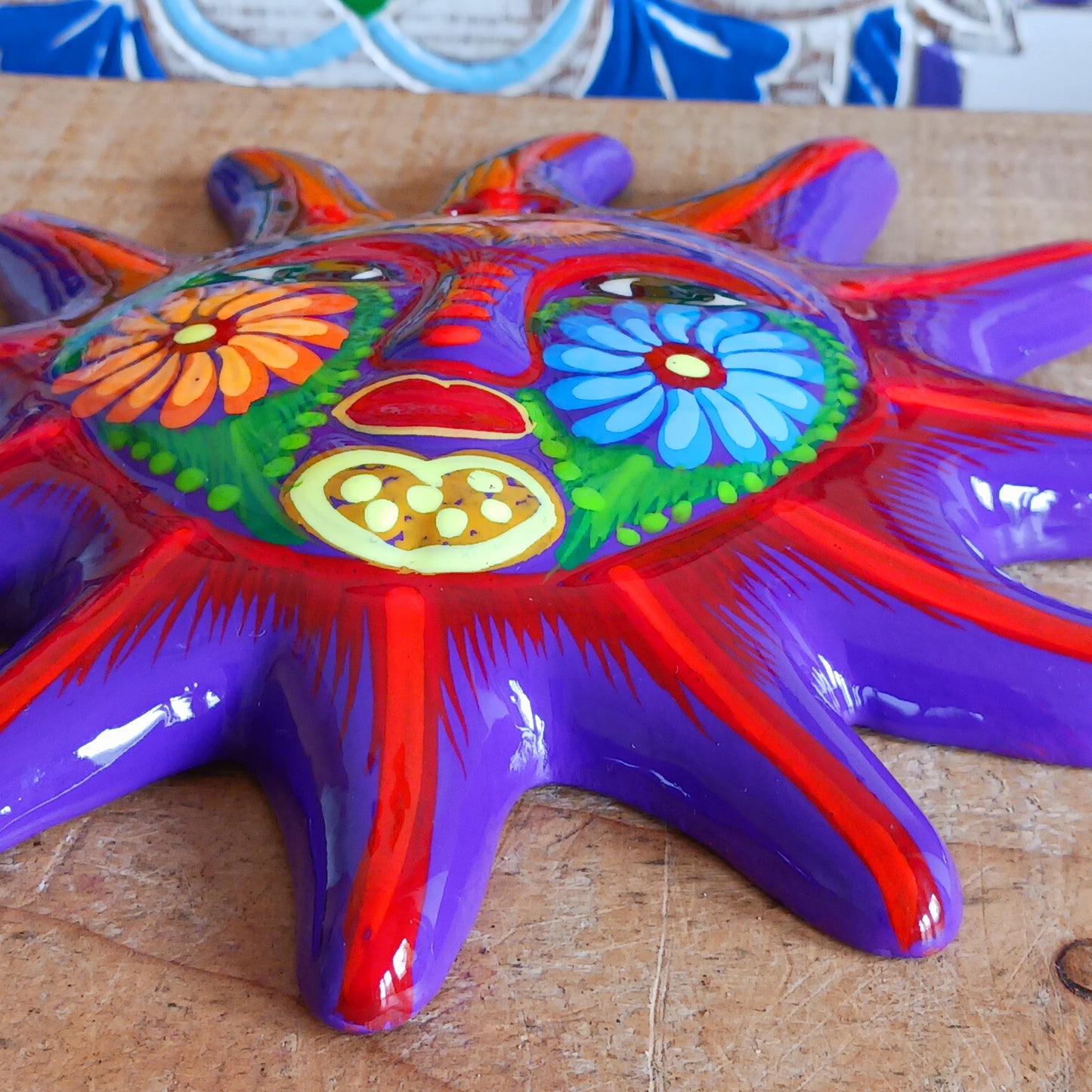 Add a burst of colour with this vibrant, hand-painted Xalitla wall plaque. Traditional Mexican folk art with a glossy finish and easy hanging design.