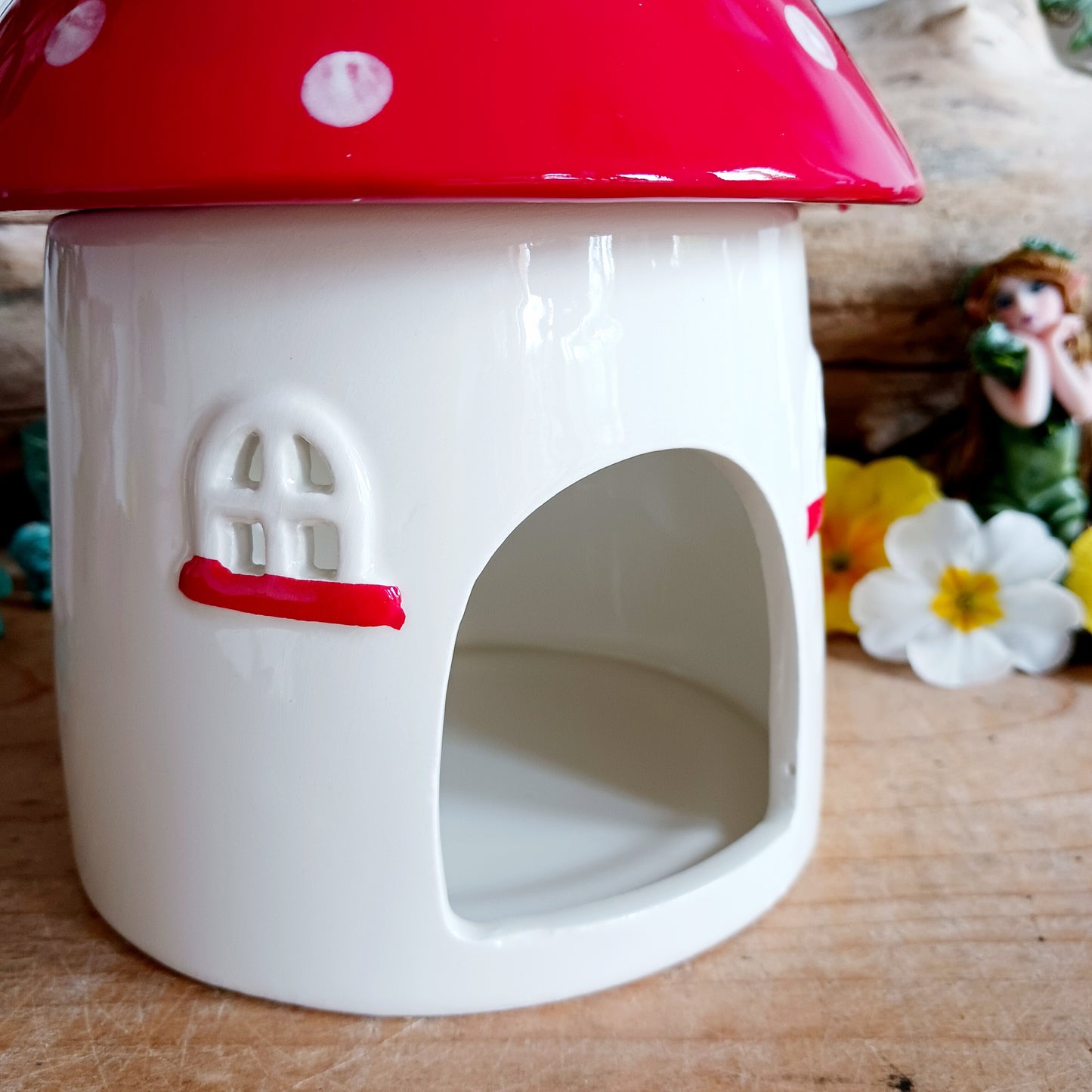 This charming mushroom house oil burner makes both a practical and eye-catching decor piece for fragrancing the home. Simply place fragrance oil diluted with water or a wax melt under the toadstool lid and light a standard tealight underneath to enjoy the calming scent.