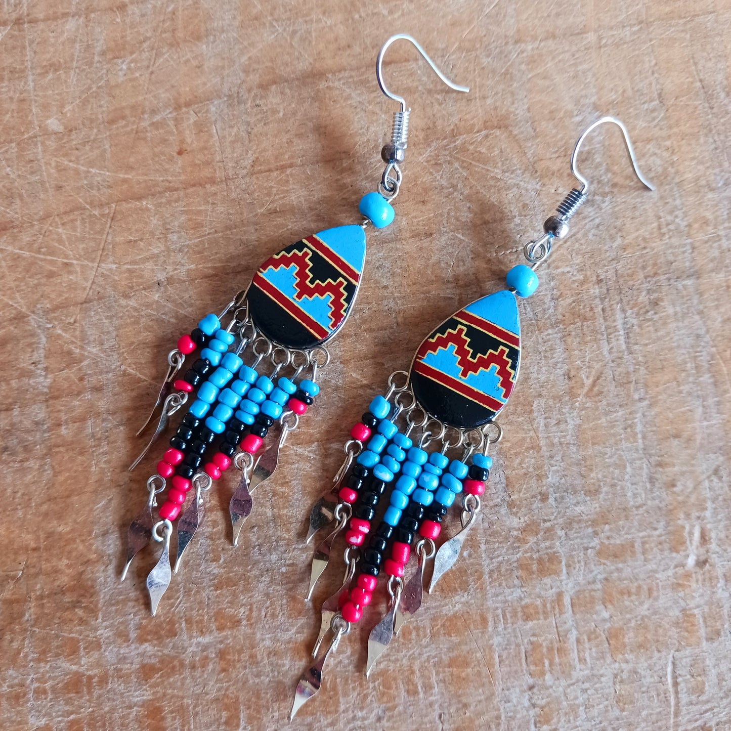 Handmade Incan teardrop earrings with traditional patterns & silver hooks. Ethically made in Peru. Unique, vibrant & perfect for Boho or gift giving.