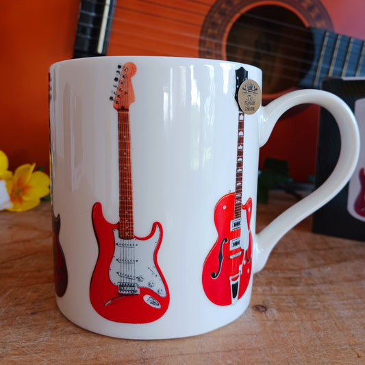 The Electric Guitars Mug by The Leonardo Collection. Featuring 6 unique electric guitars, this mug makes a brilliant gift for someone who loves guitars! With a simple but striking design, this mug is a great addition to a mug collection.