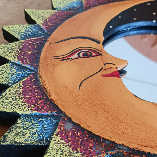 Bring celestial charm and positive energy into your home with this little Handmade Moon & Stars Mirror. Carefully crafted by Fair Trade artisans, this unique decorative mirror features a stunning purple crescent moon design that adds a mystical and spiritual touch to any room.