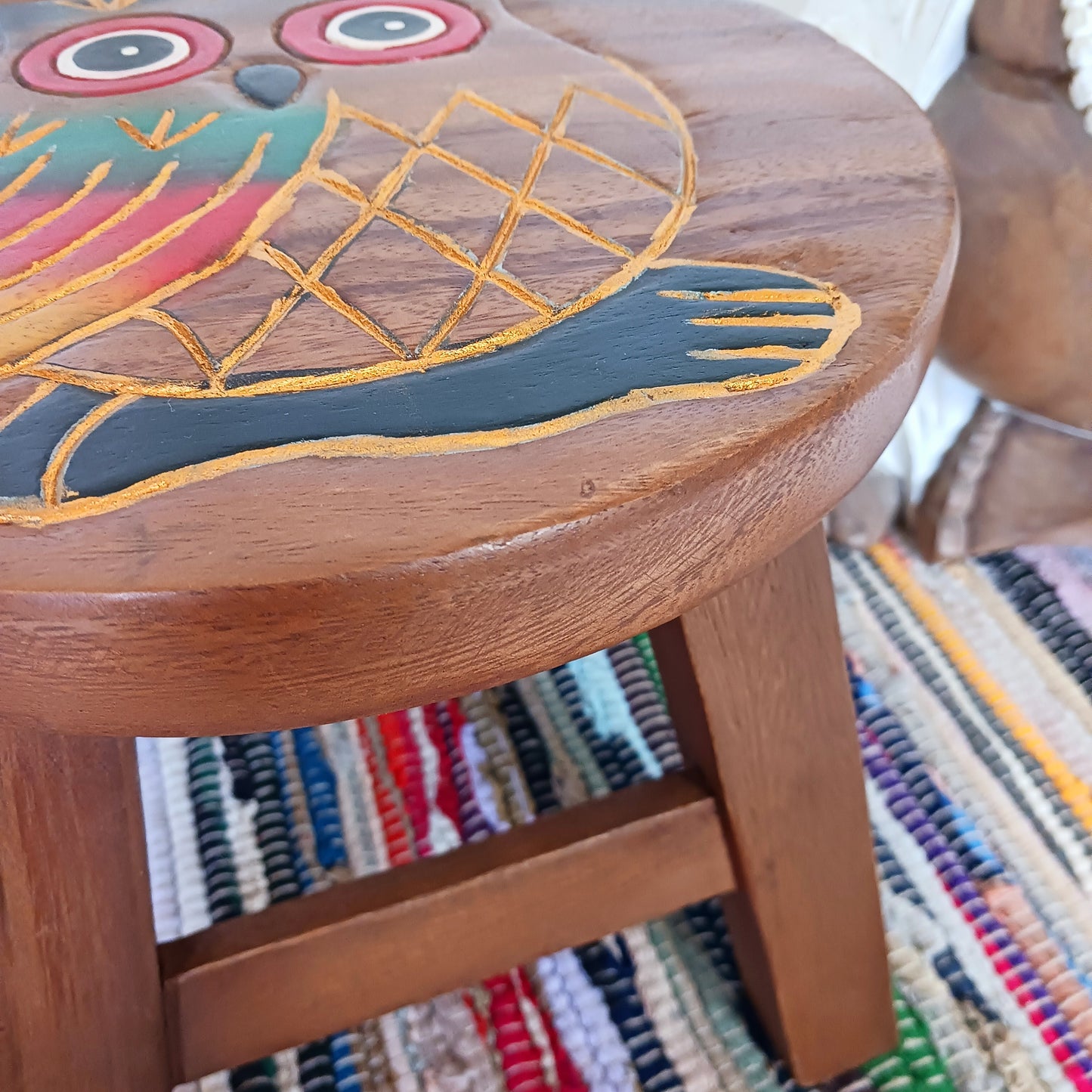 This lovely handmade, carved and painted stool is Fairtrade from Thailand. The top of this stool has been carefully hand carved and then painted to show a beautiful rustic owl. These cheeky little items are very versatile making great stools for little bums or as tiny tables to add accent to your home.