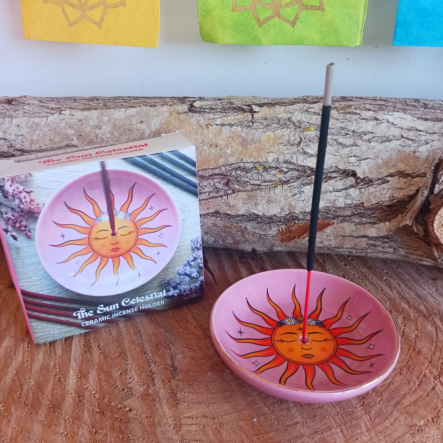 This modern incense stick holder features a lovely warm colourful sun design inspired by 'The Sun' tarot card. This ceramic dish provides a stylish and practical way to enjoy incense.