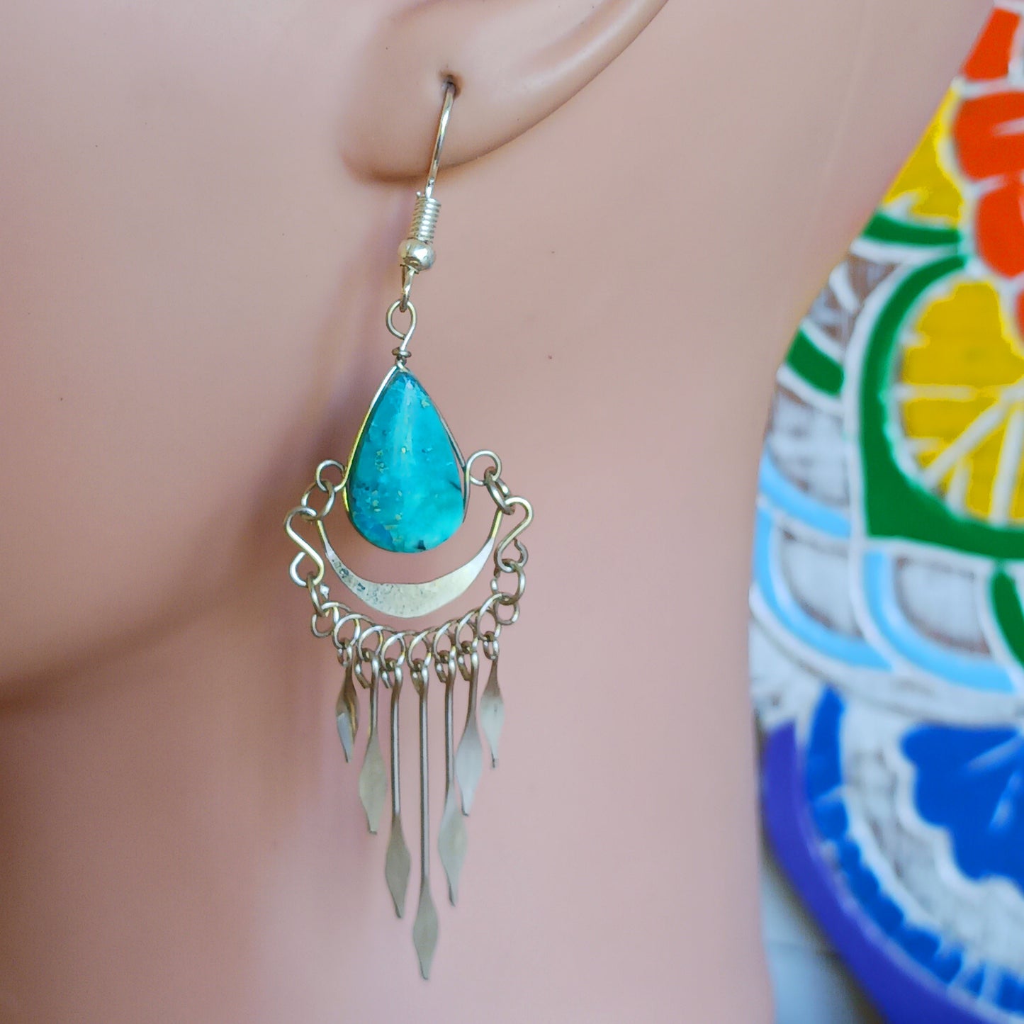 These beautiful earrings incorporate a turquoise stone with Silver plated hooks. These earrings have been hand made and are presented in a traditionally made pouch gift wrapped and ready to give☸