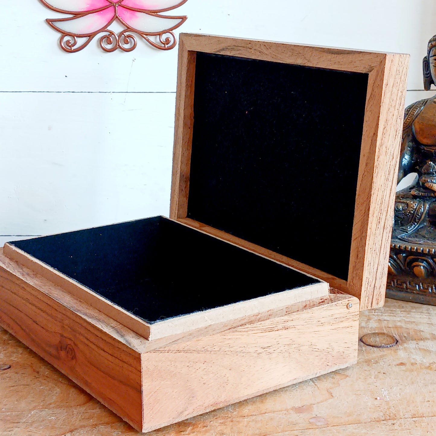 Keep your cherished items safe in this beautifully crafted mango wood jewellery box, engraved with the word ‘Namaste’. A Sanskrit greeting meaning “the divine in me greets the divine in you,” it serves as a daily reminder of connection, presence, and mutual respect. Accented with rose quartz—symbolizing love, compassion, and emotional healing—this box is ideal for storing jewellery, keepsakes, cards, or other personal treasures. Subtle, spiritual, and thoughtful, it’s a meaningful addition to any space.